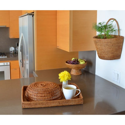 La Jolla Honey Brown Rattan Fruit Bowl Pedestal Placed in the Kitchen