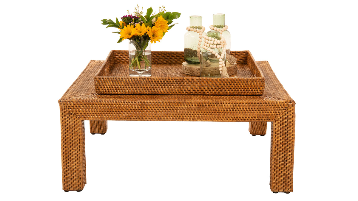 La Jolla Square Rattan Jumbo Sized Centerpiece And Ottoman Tray Placed On A Table With Beautiful Vases