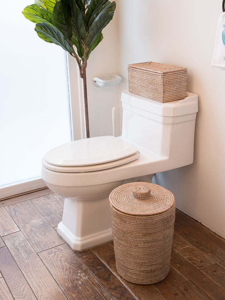 La Jolla Large Rattan Round Waste Basket with Plastic Insert & Lid Placed in the Bathroom
