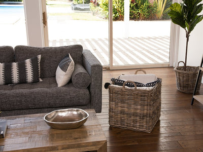 Kobo Gray Square Rattan Basket Placed Next to the Sofa